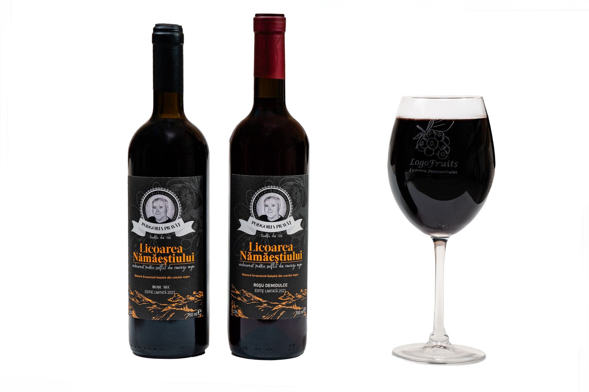 Two bottles of red wine and a filled wine glass on a white background.